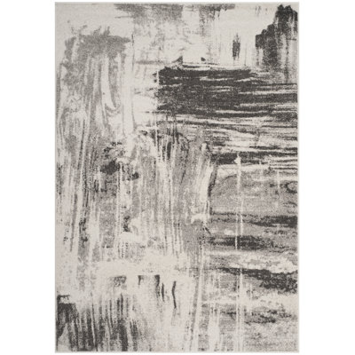 Riebe Abstract Ivory/Gray Area Rug
