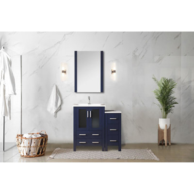 36 po Meuble-lavabo simple bleu marine avec cinq tiroirs, robinet et surface à gratter bleu, plateau en céramique