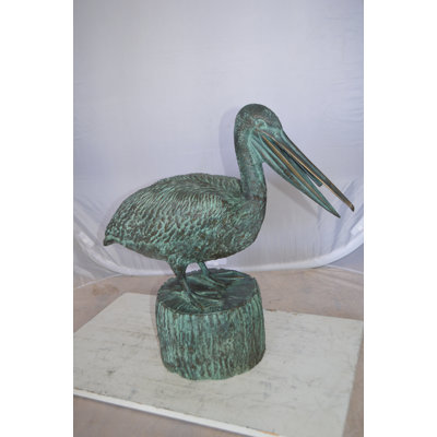 Metal Pelican on a Tree Stump Fountain