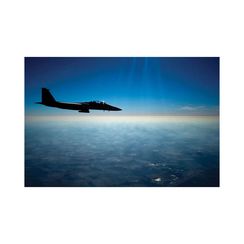 A US Air Force F-15E Strike Eagle In Flight Over North Carolina by Stocktrek Images - Wrapped Canvas Print