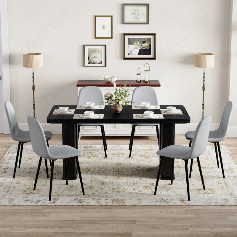 Ensemble de table et de chaises 64,5 po x 35,4 po de style table de salle à manger en bois noir texturé et élégant.