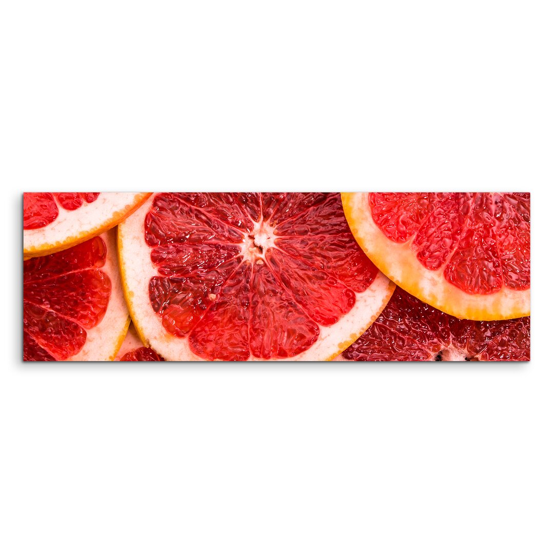 Gerahmtes Leinwandbild Aufgeschnittene Grapefruit