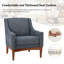 Fauteuil Arshanti avec pieds en bois massif-76353533