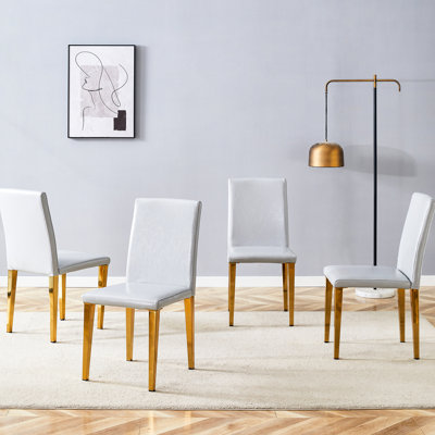 De 4 chaises de salle à manger en polyuréthane gris - Design tendance, expérience confortable avec glissade en métal moderne et confortable