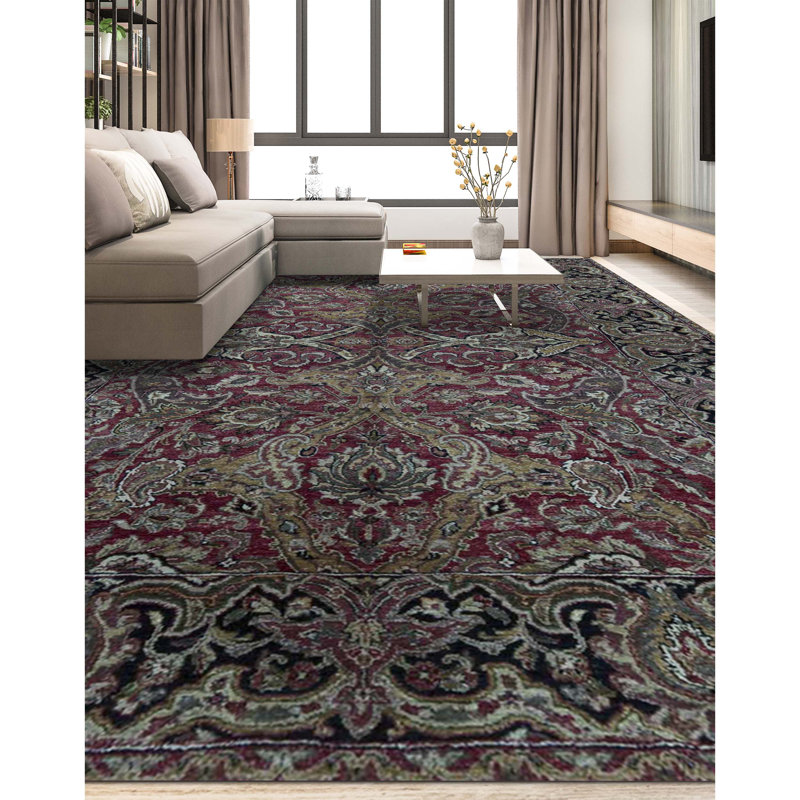 Suruchi Wool Oriental Area Rug in Purple/Black