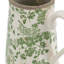 Vase en céramique blanc avec motif floral vert