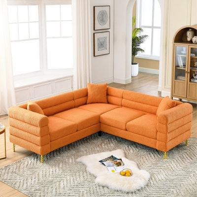 81.5-inch L-shaped Sectional Couch, 5 Corner . Streamline Modern Style With Gentle Curves. Solid Wood Frame & Metal Legs. Orange Fabric, Foam Filler. 3 Pillows Included. 250 Lbs/seat Weight Capacity.