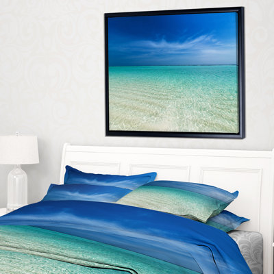 " Turquoise Ocean Under Blue Sky "
