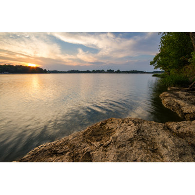 Sunset Over The Lake by Tomofbluesprings - Wrapped Canvas Print