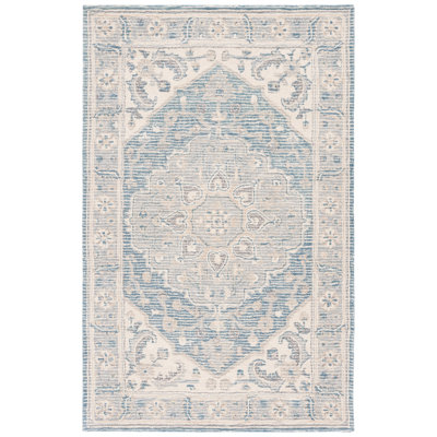 Tapis bleu / ivoire Metro 617