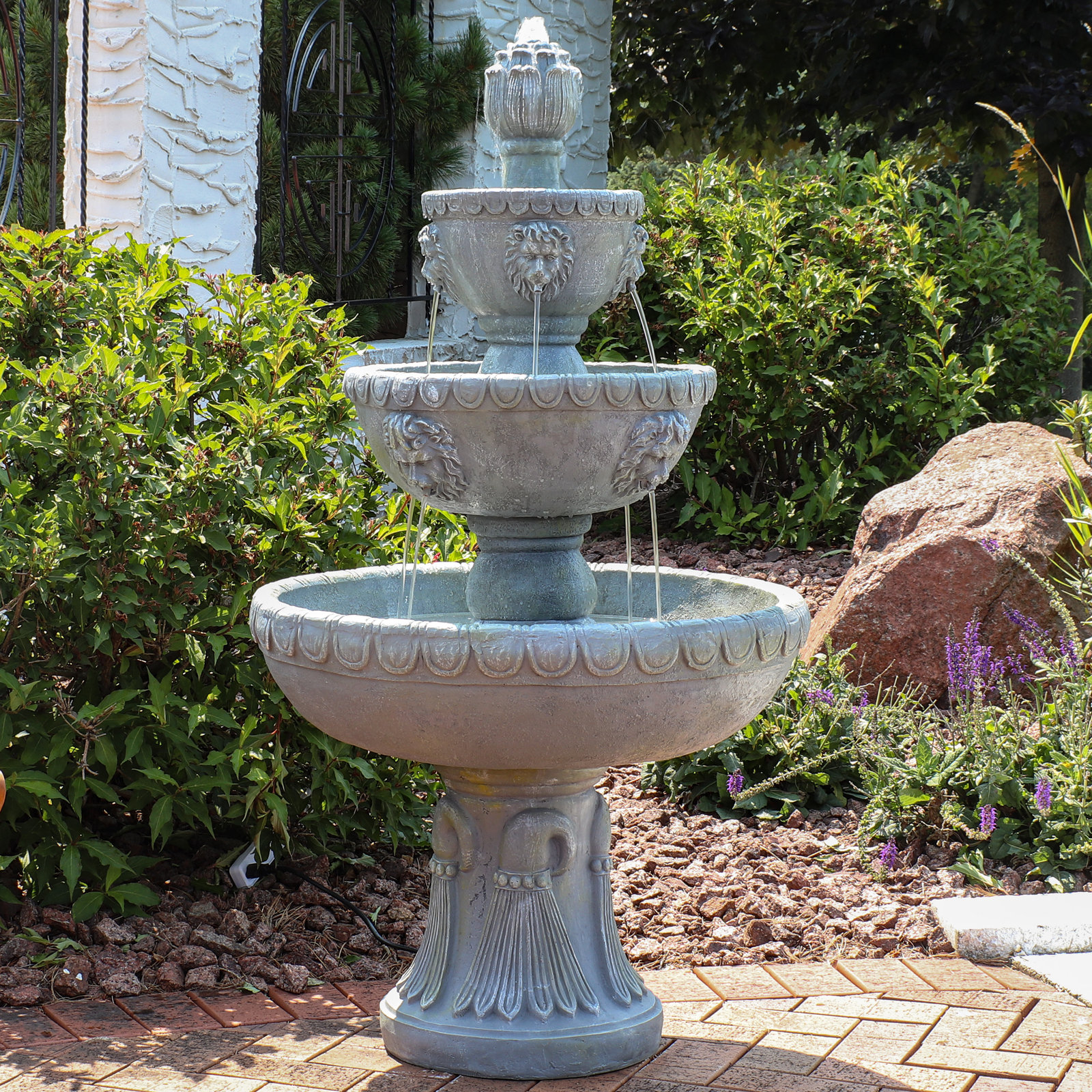 Dunaway Lion Head Traditional Resin 4-Tier Outdoor Water Fountain