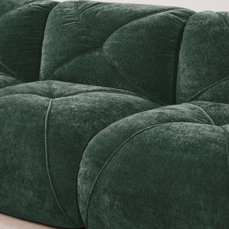 Canapés ergonomiques en velours vert, design moderne et confort de salon