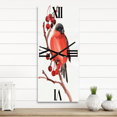 Horloge murale bouvreuil sur une branche avec des baies