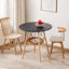 Table de salle à manger ronde avec panier de rangement sous la table, plateau en panneau de fibres à densité moyenne noir profond de 31,5 po, pieds en bois massif, pour 2 à 4 personnes-131248029