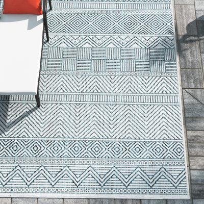 Tapis intérieur / extérieur turquoise Melillo Southwestern