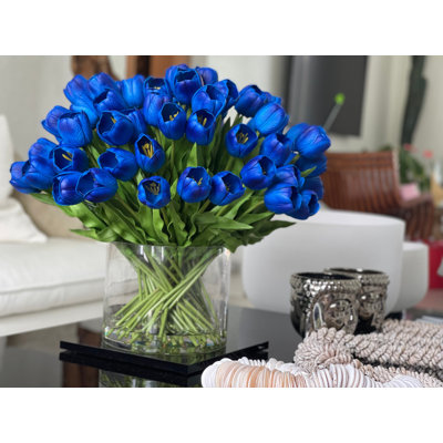 Grand cylindre Rota avec tulipes bleues 