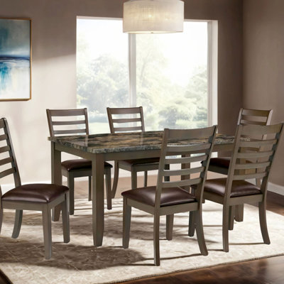 Ensemble de salle à manger simple classique 7 pièces avec plateau en faux marbre et sièges en similicuir, parfait pour les intérieurs modernes et traditionnels