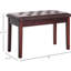 Banc de piano avec rembourrage en similicuir brun et structure en bois massif pour base de piano à deux places.