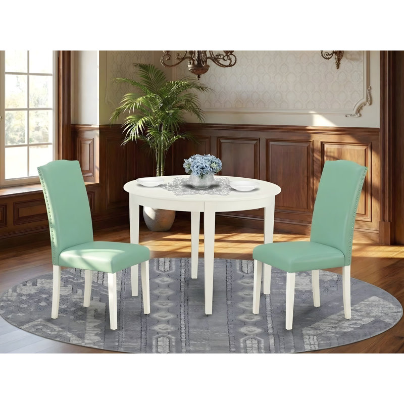 L'ensemble de table de salle à manger 3 pièces comprend une table de cuisine ronde et 2 chaises Parson rembourrées en similicuir, 42 x 42 pouces, blanc lin