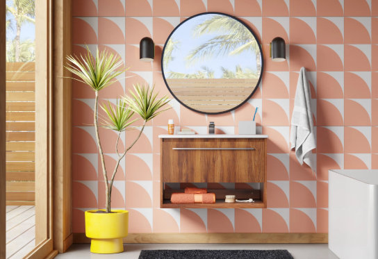 bathroom with pink geometric wallpaper