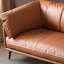 Causeuse coussin orange en cuir véritable