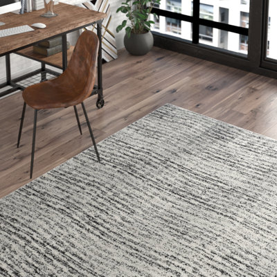 Riebe Abstract Black/Silver Area Rug
