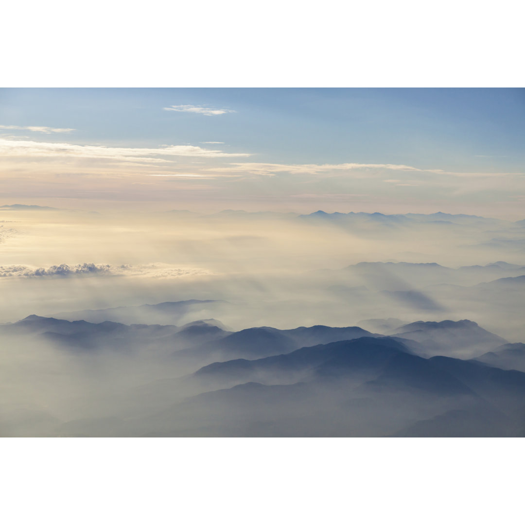 Flying Over The Clouds von Guvendemir - Drucken