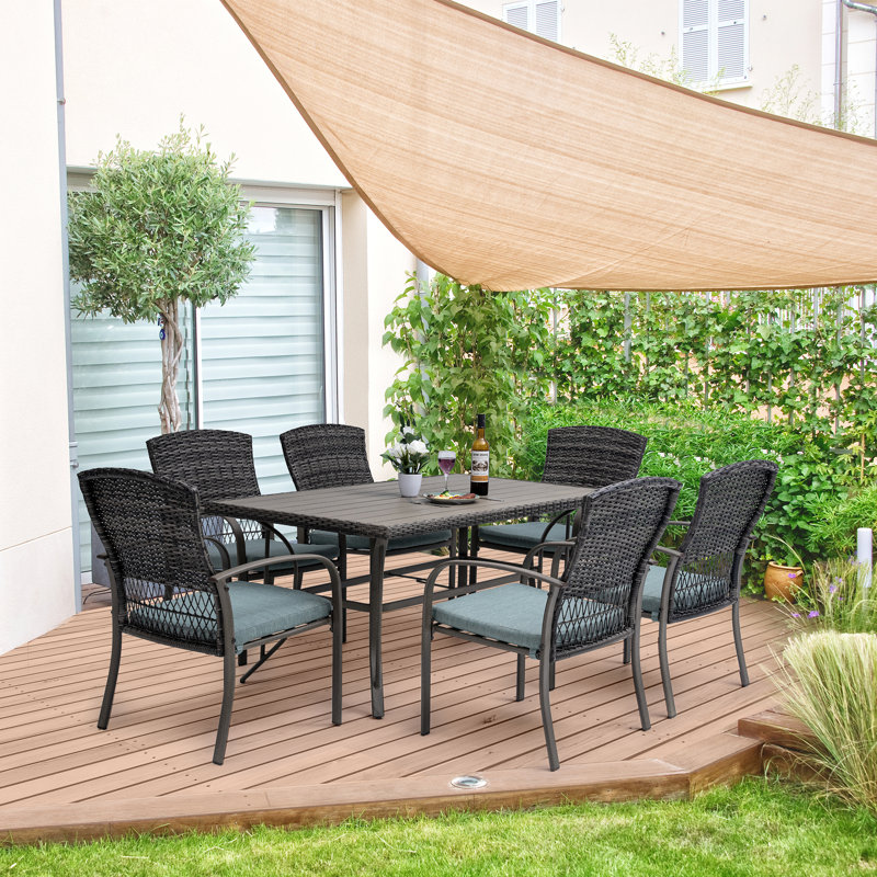 Hainer 6 - Person Wicker Patio Dining Set with Rectangular Table , Cushions Included, Green, Brown