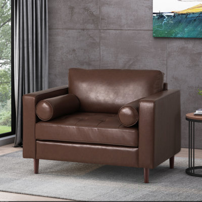 Luxueux fauteuil club en similicuir avec pieds en bois de bouleau espresso, parfait pour des sièges élégants et confortables.