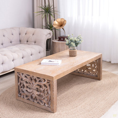 47.2" Rustic Carved Wood Coffee Table – Handcrafted Look With Ornate Side Panels Finish
