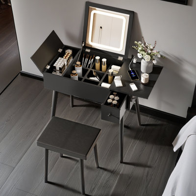 Meuble-lavabo noir 27,9 po avec miroir rabattable, lumières DEL, station de charge, 2 tiroirs, panneau pliable et tabouret rembourré pour l'ensemble de maquillage de chambre à coucher