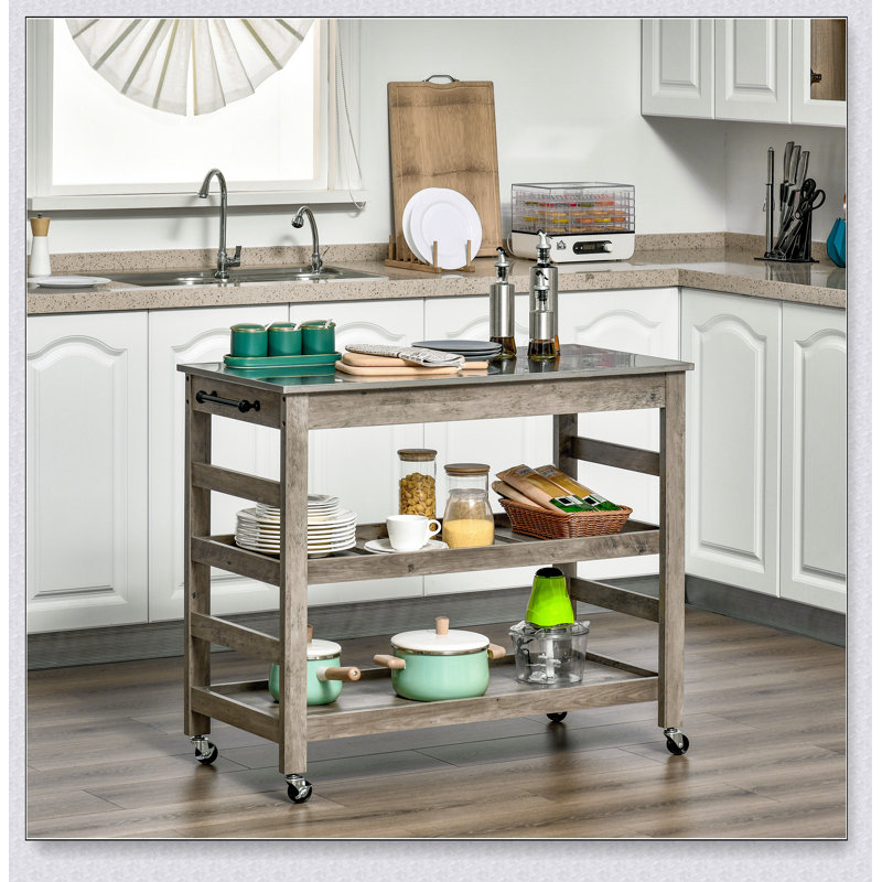 Chariot de cuisine roulant avec comptoir en acier inoxydable et rangement spacieux, parfait pour les cuisines modernes et l'organisation efficace.