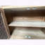 Armoire rustique vintage avec panneaux floraux sculptés et bois vieilli