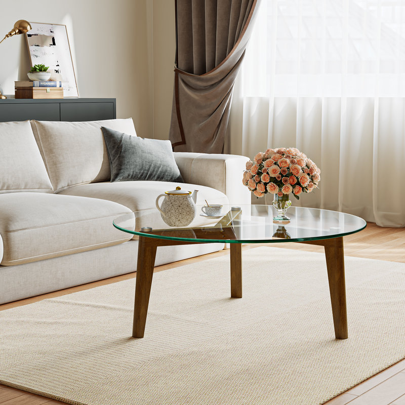 Table basse avec plateau en verre et structure en bois massif