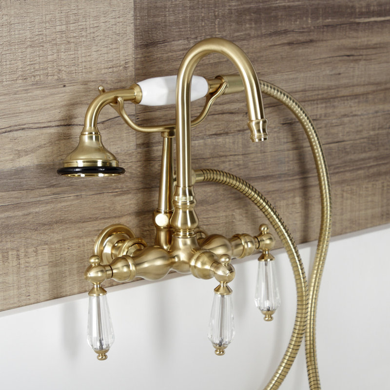 Kingston Brass Wilshire Three-Handle 2-Hole Tub Wall Mount Clawfoot Tub Faucet with Hand Shower, Brushed Brass