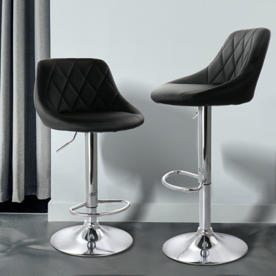 Jaretta Swivel Upholstered Adjustable Height Counter Stool with Metal Frame
