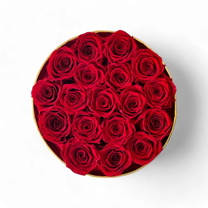 Arrangement floral rose en boîte