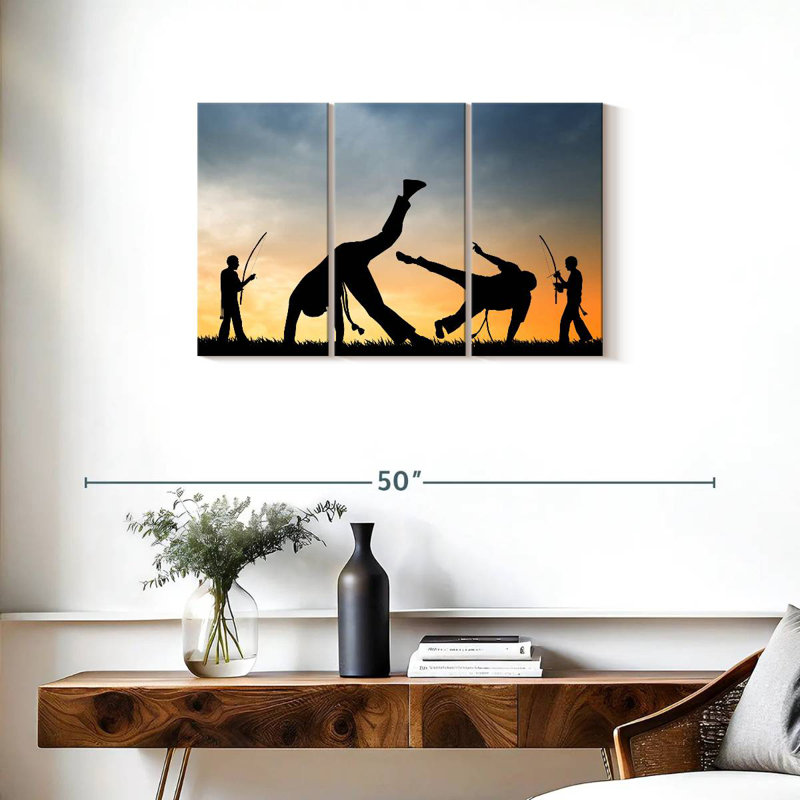 Silhouette de capoeira au coucher du soleil, H 20 po x l 33 po