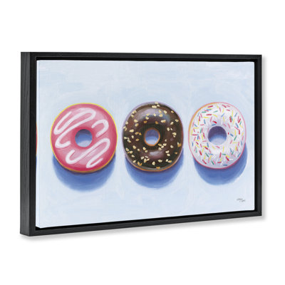«Three Donuts Trio», toile flottante brune encadrée par Wild Apple