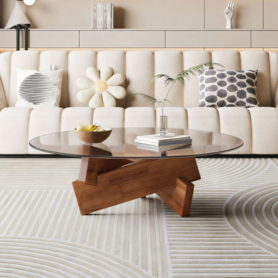 Table basse ronde moderne avec plateau en verre trempé et base en bois de noyer