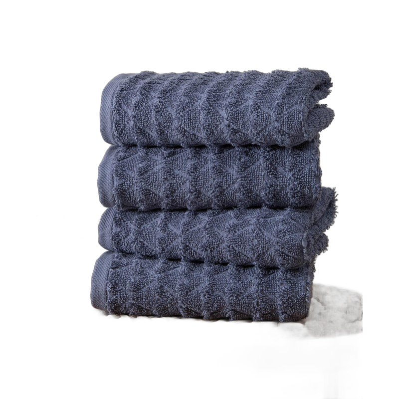 Lot de quatre serviettes de toilette géométriques bleu marine en coton turc 16" x 30"