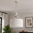 4 - Light Whitewashed Drum Chandelier with Palm Leaf Detailing and Fabric Shade