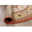 Tapis ivoire/rouge/brun rond oriental