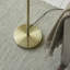 Pharmacy Reader Floor Lamp finished in Ant. Brass