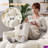 Naomi 91.73 "W Fixed L-shaped teddy fleece sectional, with USB Port And Center Console.-117457651