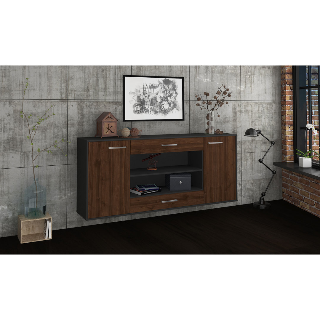 Das Sideboard Mussab hat Metallgriffe. Es hat die Maße 180 cm x 79 cm x 35 cm.