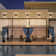 Modern Outdoor Slant-Top Hardtop Gazebo With Black Metal Frame And Curtains