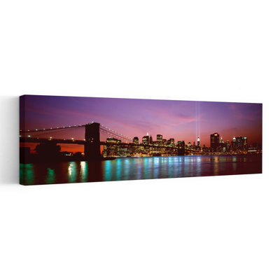 Skyscrapers Lit Up At Night World Trade Center Lower Manhattan Manhattan New York City New York State USA by Steven Lindner - Wrapped Canvas Panoramic Print