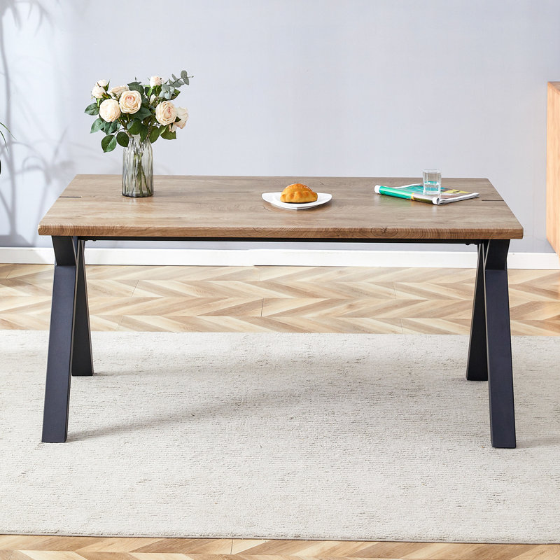 Table de salle à manger 63 po x 35,4 po en bois MDF texturé avec pieds en A noirs. Autocollant de panneau de densité (seulement les tables, pas de chaises)