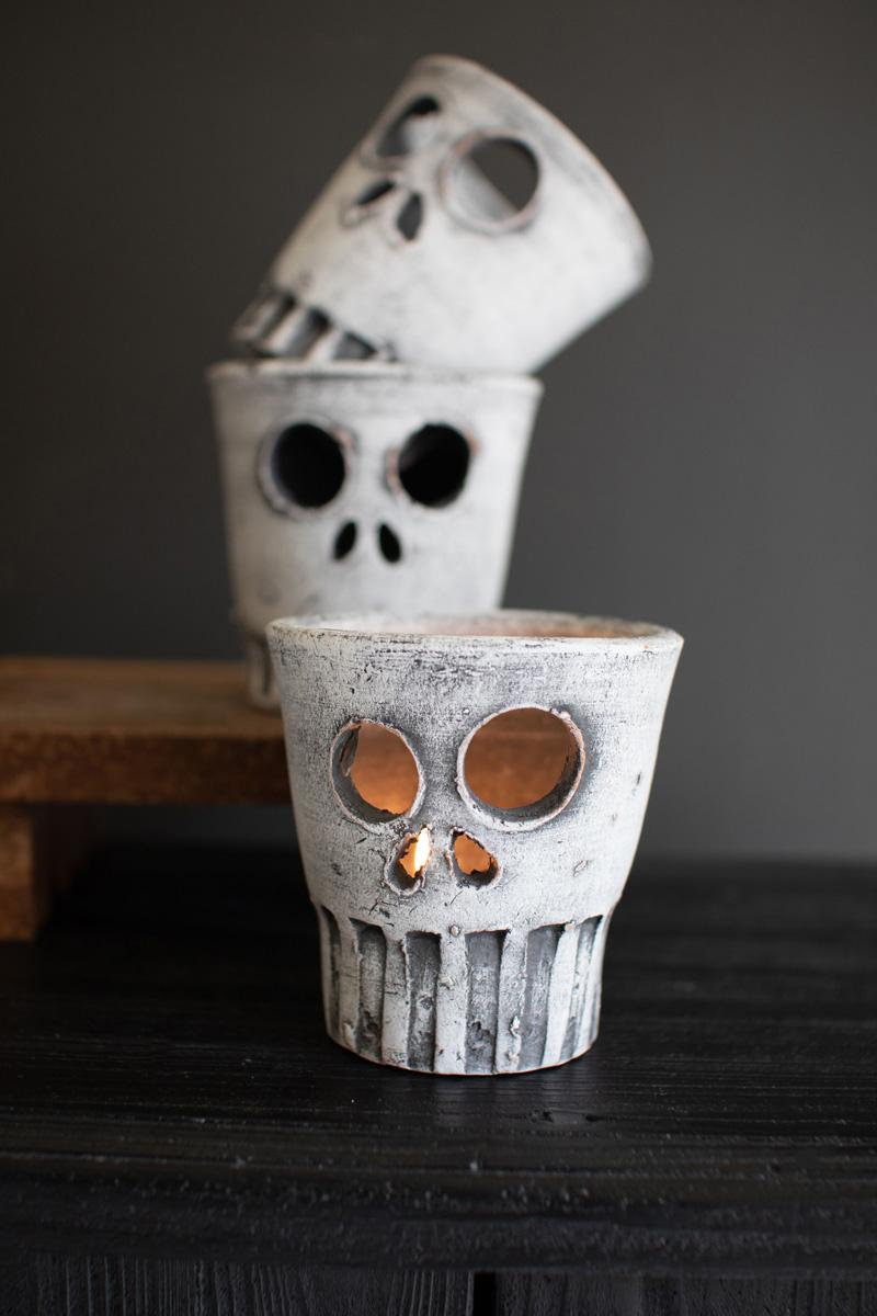 SET OF THREE HALLOWEEN SKULL VASES